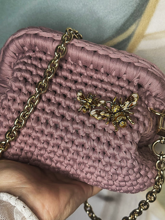 Clutch malva con tracolla