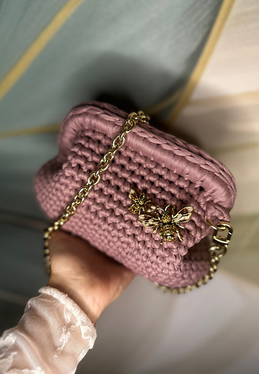 Clutch malva con tracolla