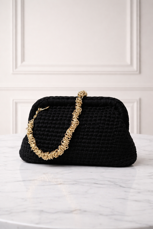 Clutch nera oro intreccio